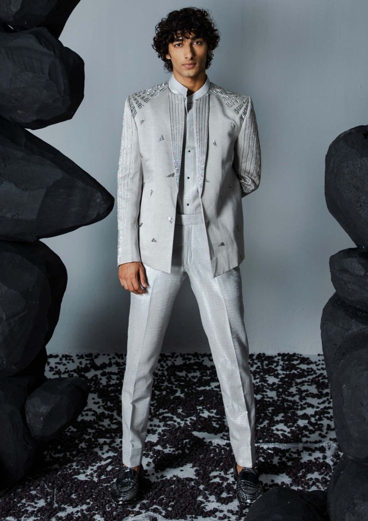 Elevate your style with a gray open jacket adorned with statement embroidery on the shoulder. Paired with a jacquard shirt and pants, this ensemble effortlessly combines modern sophistication with intricate detailing for a refined and distinctive look. Modern Mens Fashion, Indian Men Fashion, Pants Linen, Vacuum Storage, Jacquard Shirt, Open Jacket, Indian Wedding Wear, Indian Man, Silk Jacket