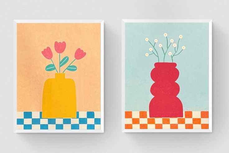 two colorful vases with flowers in them sitting on a checkerboard tablecloth