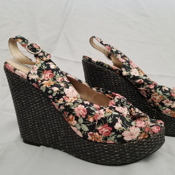 Nwot Never Worn Peep Toe Wedges! Black Espadrilles Wedged Has A Slight Sparkle With Pink Floral Pattern. Knotted Above Peep Toe. No Shoe Box Vintage High Heel Wedge Sandals For Spring, Spring Vintage High Heel Wedge Sandals, Casual Wedge Sandals With Floral Print, Spring Vintage Wedge Heel Heels, Casual Floral Print Wedge Heel Sandals, Spring Vintage Wedge Heels, Casual Floral Print Wedge Sandals, Vintage Wedge Sandals For Spring, Vintage Wedge Heel Sandals For Spring