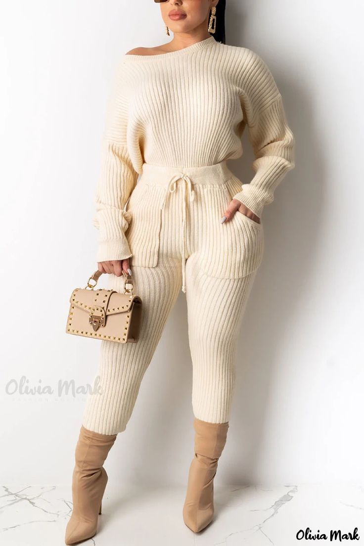 Olivia Mark - Stylish Womens Two-Piece White Solid O-Neck Pullover and Pants Set, Ideal for Casual Daily Wear White Loungewear Sets For Winter, White Winter Loungewear Sets, Beige Jumpsuits And Rompers For Fall Loungewear, Beige Loungewear Sets With Pockets, White Winter Sets With Pockets, Cream Long Sleeve Cotton Jumpsuit, Casual Beige Long Sleeve Jumpsuits And Rompers, Beige Long Sleeve Casual Jumpsuit, White Sets For Loungewear In Fall