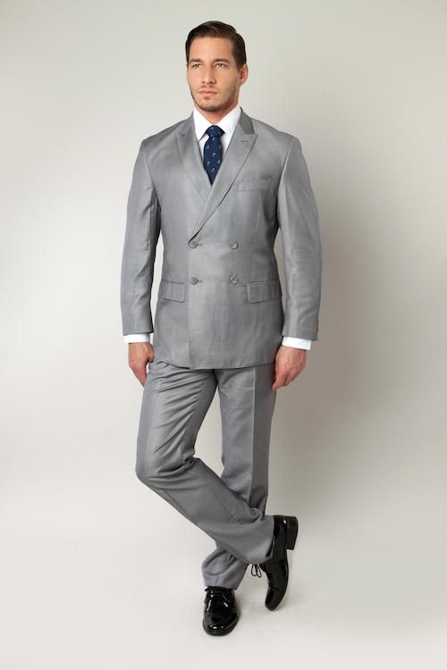 This men's grey double breasted suit has a classic design that has been brought up-to-date with satin trim and rich colors. The trousers are formal and sleek, making this a crisply tailored business suit for men of distinguished taste. Enjoy suave, elegant design that can rival the best Italian suits! Features Includes: Suit jacket, and pants JACKET: Full Lined, 2 X 4 Double breasted, Peak Lapel, Center Vents PANTS: Flat Front, 37 Inch Insteam, unhemmed. Lined to the knee Fit: Slim fit Fabric: P Mens Suits Black, Mens Suits Modern, Man Suits, Traditional Suit, Suits Men Business, Italian Suit, Suit For Men, Fashion Suits, Peak Lapel