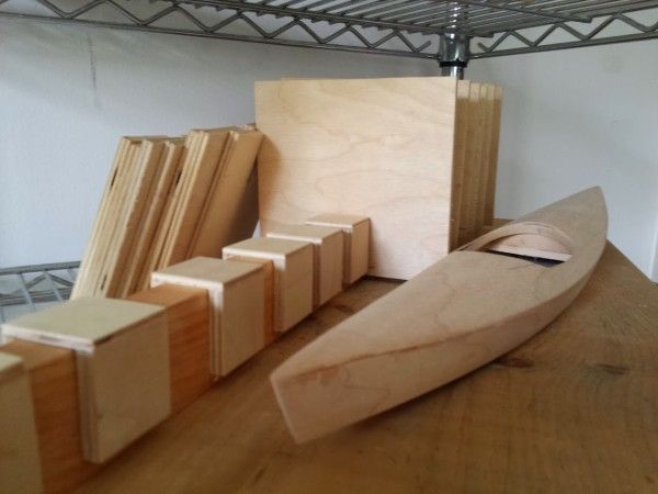 several pieces of wood sitting on top of a wooden table