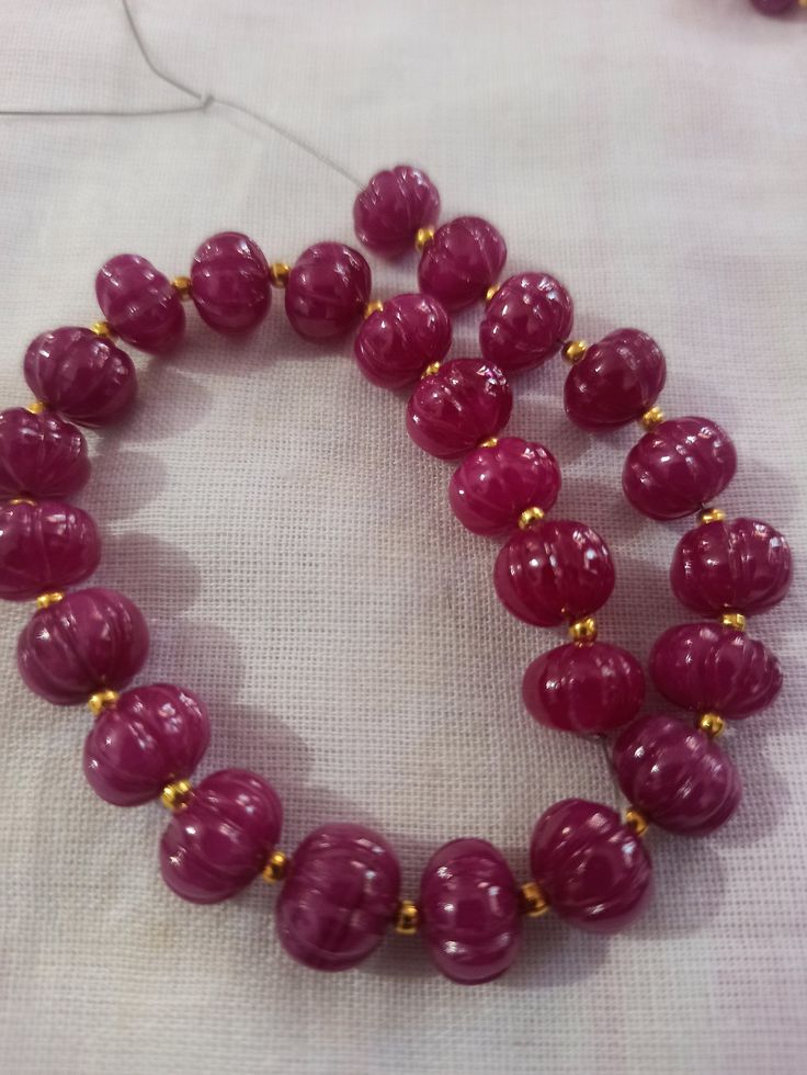 Ruby Pumpkin Natural Ruby Corundum Carving Pumpkin Beads Round Beads Gemstone String 1.Ruby Pumpkin shape 2. Ruby Corundum 3. 112 -carat weight - Approx -11 mm Size - 3.5 inch 9 piece String 4. 170 -carat weight - Approx - 10 mm Size - 6.5 inch 19 piece String 5. 167 -carat weight - Approx - 9 mm Size - 8 inch 25 piece String 6. 169 -carat weight - Approx - 8 mm Size - 10 inch 30 piece String 7, The necklace is with tassel because you can easily adjust your necklace length. 8. If you want any ch Elegant Round Spacer Beads, Round Faceted Beads, Spiritual Gemstone Beads For Festive Occasions, Spiritual Festive Gemstone Beads, Handmade Rondelle Beads For Jewelry Making, Pink Polished Round Beads, Traditional Rondelle Large Beads, Artisan Round Spacer Beads, Ruby Rondelle Polished Beads Jewelry