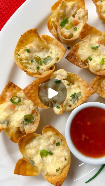 small appetizers on a plate with dipping sauce