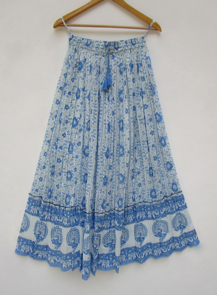 "ITEM DESCRIPTION clouds sky blue flower look beach wear women printed maxi skirts - broomstick style ethnic wear maxi skirts Material: 100% cotton cambric soft crinkled fabric Length: - 38 inch long Waist :-28.00 inch full (14 inch half) 28 inch relaxed can stretch up to 50 inch Size: free size (fit to all) PRODUCT NAME: - Long Women Maxi skirts Ladies Vintage Long skirts Company Return Policy: Please write for more information to my email directly CHOOSE \"ASK SELLER QUESTION \" payment policy Affordable Summer Floral Print Maxi Skirt, Affordable Multicolor Maxi Skirt For Beach, Affordable Summer Maxi Skirt For Beach, Cheap Beach Floral Print Maxi Skirt, Cheap Casual Maxi Skirt For Beach, Cheap Buttoned Skirt For Beach, Cheap Summer Skirt For Beach Season, Luxury Blue Skirt For Beach, Affordable Light Blue Beach Skirt