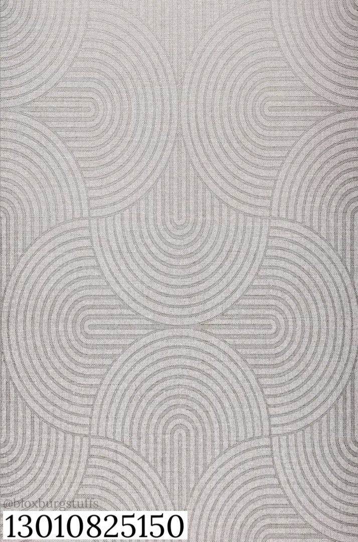 an area rug with circles on it in grey and white colors, as well as a pattern