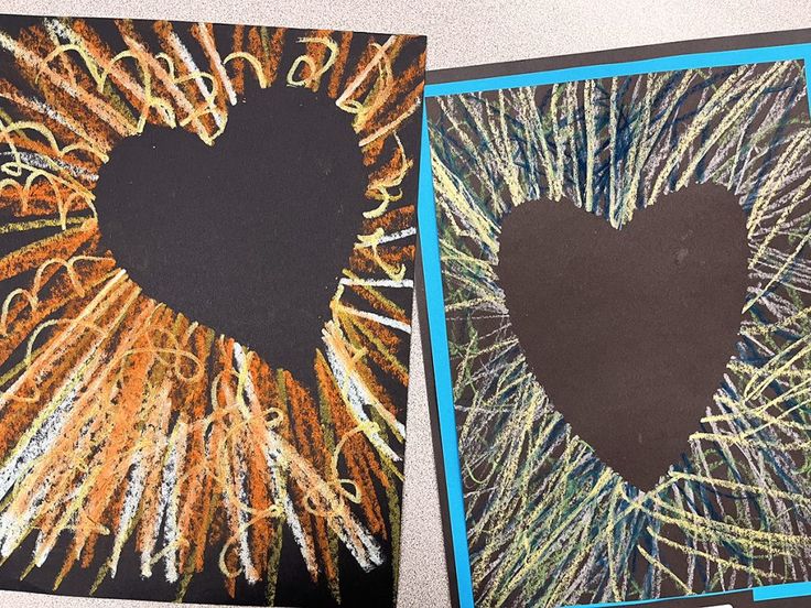 two pictures with different colored writing and a black heart in the middle one is made out of crayons