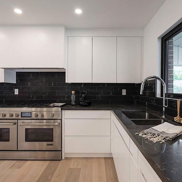 the kitchen is clean and ready for us to use it's stainless steel appliances