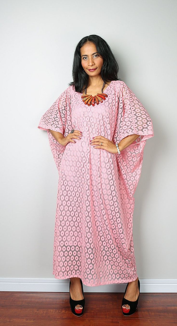 "A stunning bohemian lace caftan dress with a subtle v shaped neck and backbone The dress is handmade from a quality polyester lace fabric and has a gorgeous flow. The big wide sleeves and trendy design gives a romantic feel to this dress, which has very tidy sewing and is made with the highest care. The measurements given below are based upon the inner lining. This gorgeous boho soft dusty pink lace dress is ideal for a family gathering, going to the beach, a garden party, a nice evening out on Bohemian Maxi Dress With Lace Patchwork For Parties, V-neck Lace Patchwork Maxi Dress For Beach, V-neck Maxi Dress With Lace Patchwork For Beach, Bohemian Maxi Dress With Lace Trim For Party, Beach Lace Maxi Dress, Flowy V-neck Maxi Dress With Lace Patchwork, Pink Lace V-neck Maxi Dress, Pink Lace Maxi Dress With V-neck, Bohemian Lace Maxi Dress For Party