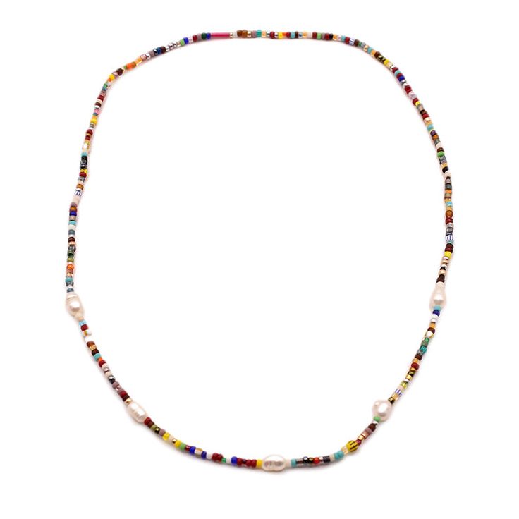 Our latest jewelry group is inspired by the African trade beads we've come across in markets there. The random and vibrant mix of patterned and colored glass beads is always appealing. Here we've given it a modern vibe with this stretch choker adorned with freshwater pearls. Dress it up or down for everyday wear! Made with our artisan partners in the Philippines. 15.5" around on stretch nylon. Adjustable Bohemian Pearl Necklace With Colorful Beads, Bohemian Pearl Necklace With Colorful Beads And Adjustable Fit, Bohemian Pearl Necklace With Colorful Beads, Adjustable Multicolor Pearl Necklace For Summer, Multicolor Single Strand Bead Choker, Bohemian Multicolor Single Strand Pearl Necklace, Trendy Multicolor Round Beads Pearl Necklace, Adjustable Multicolor Pearl Necklace With Tiny Beads, Multicolor Adjustable Pearl Necklace With Tiny Beads