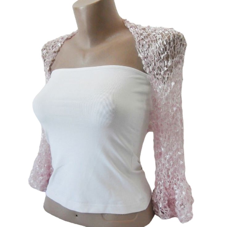 This Pale Pink Ruffle Sleeves Bolero is a perfect accessory for your summer outfit. It gives an elegant silky touch and is proper for the late spring and the summer months. Be the star at the dancing with this lightweight loose shrug. It matches perfectly with an evening dress as well over a party top.   This bolero is quite stretchy. Ask for a Custom order to fit exactly your size ot choose it according to the measures given below. It is available in Plus size also. Please contact us to send us Spring Party Lace Shrug, Spring Party Crochet Top, Elegant Crochet Top For Spring, Summer Party Shrug With Stretch, Feminine Crochet Top For Spring Party, Long Sleeve Summer Shrug For Party, Stretch Summer Party Shrug, Stretch Crochet Top For Spring Party, Fitted Crochet Shrug For Summer