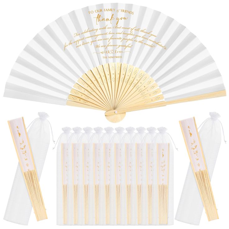 a white and gold wedding fan with matching ribbons