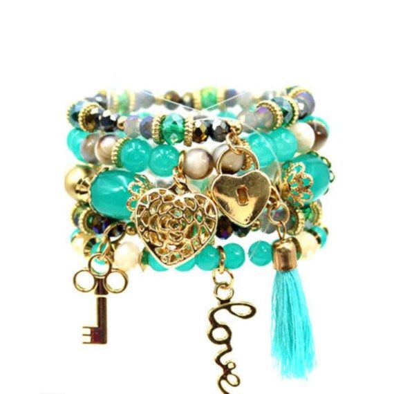 Fashion Turquoise Bracelet, Turquoise Glass Beads Gold Charm Womens Bracelet, Boho Bracelet ♦ Gift For: Mom, Daughter, Sister, Girlfriend, Wife ♦ Occasions: Casual, Office, Party, Birthday, Anniversary, Date ♦ TURNAROUND TIME: ♦ Your order will be shipped in 1 business day. US customers should receive their order within 2-3 business days. International orders will take 3-4 weeks. ♦ More from us https://www.etsy.com/shop/JazzyButtonsCo?ref=seller-platform-mcnav ♦ Instagram: https://www.instagram.com/beadsselavie ♦ Facebook: https://www.facebook.com/Beadsselavie/ Womens Bracelet, Cuff Watch, Turquoise Glass, Boho Bracelet, Bracelet Boho, Office Party, Casual Office, Cz Ring, Mom Daughter