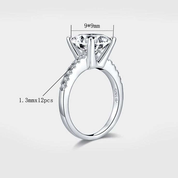 the side view of a diamond engagement ring with measurements