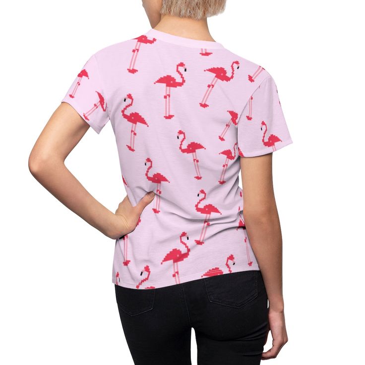 Be a flamingo in a flock full of pigeons. With this cute pink 8-bit flamingo printed tee, you will definitely be able to stand out in a crowd. This fluorescent pink bird-covered tee can be worn on all kinds of occasions: to go to school, while hanging out with friends, or even to sleep in as pajamas. These flamingos know no limits. Product Details Regular Fit T-Shirt Round neck Short sleeves Flamingo print About Me Medium Fabric (0 oz/yd² (170 g/m²)) Tagless Runs true to size 100% Polyester XS S