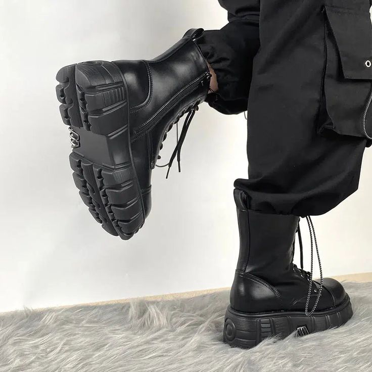 These combat boots embody the grunge aesthetic, featuring adjustable lace-up ties and a convenient zip closure. The silver accessories on the platform add a distinct edge, making them perfect for anyone who loves casual, cool, punk, or streetwear styles. Grunge aesthetic Adjustable lace-up ties Zip closure Silver accessory details on platform Faux leather Heel height: 6cm (2.3inc) Ankle Combat Boots, Platform Combat Boots, Fall Sweaters For Women, Punk Women, Streetwear Styles, Denim Hoodie, Jogger Pants Casual, Chunky Shoes, Faux Leather Heels