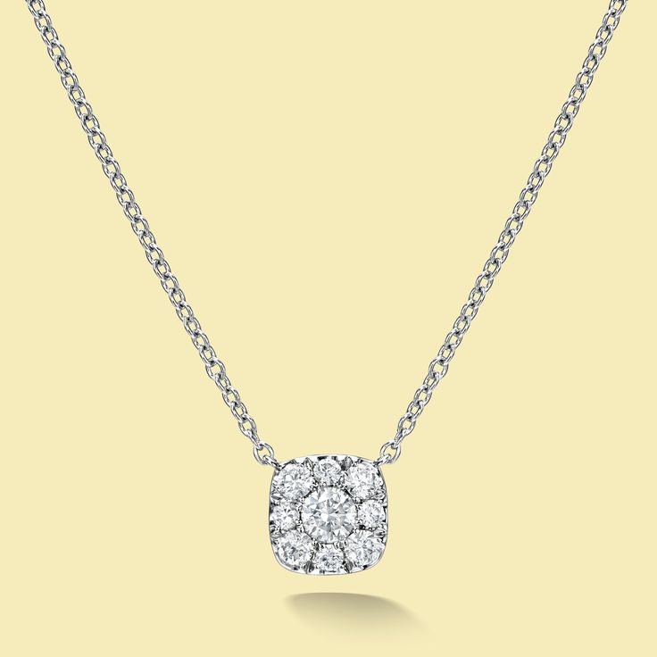 The Alia, Cluster Diamond Cushion Shaped Necklace is handcrafted in 14K Gold, 18K Gold, or Platinum. Experience the alluring beauty of our Alia cluster diamond cushion-shaped necklace, showcasing a stunning center diamond encircled by a halo of pavé-set diamonds, ideal for layering and daily wear. Personalize the necklace's length to your liking, with choices of 16, 17, or 18 inches, for a bespoke fit that reflects your individual style.// Details //• Style Name: Alia• Necklace Style: Cluster• S Timeless Diamond Necklace With Square Pendant, White Gold Necklace With Cushion Cut Halo Setting, White Gold Cushion Cut Necklace With Halo Setting, Square Pendant Diamond Necklace With Brilliant Cut, Timeless Square Pendant Diamond Necklace For Wedding, Formal Square Pendant Diamond Necklace With Accents, Formal Diamond Necklace With Square Pendant, Elegant Diamond Solitaire Necklace With Square Pendant, Diamond White Cushion Cut Jewelry With Pave Setting