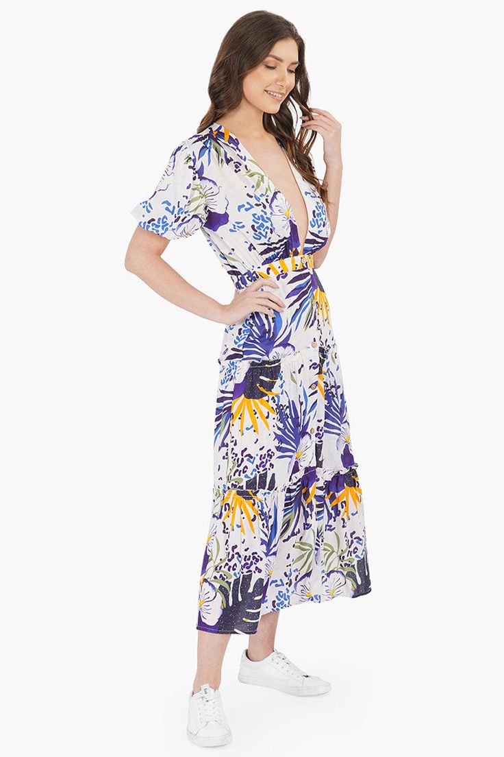 Midi Dress V-neckline Button down closure short puff sleeves with elasticated hem Blue tropical print all over Loose and comfortable fit Made in soft viscose fabric Let the sun shine, let the flowers bloom, let the rainbow gleam through! None of it can hold a candle to our beautiful tropical twilight cover up. Is it time for the vacay you have been waiting for since ages. Bro Tip? Pack this sexy, comfy and sassy midi dress and you're set to take the flight off! Pair this piece with an adorable p Twilight Cover, Leopard Bag, Sun Shine, Vacation Looks, Flowers Bloom, Viscose Fabric, Bag Dress, Tropical Print, Sun Hat