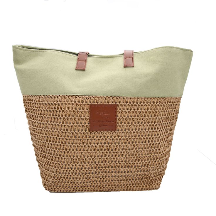 Summer Raffia Tote Treat yourself to this stylish and functional Summer raffia tote bag. Whether you are beachgoing, lounging around the resort, or heading out for the day on a sunny afternoon, this bag is your go-to resort wear tote. Made from raffia and canvas with a cotton lining, this bag is large enough to store your must-haves for your day out. Available in beige or soft apple green canvas trim. The handles and logo patch are made with vegan leather. Sand-colored Bucket Straw Bag For Travel, Khaki Tote Straw Bag For Daily Use, Casual Khaki Straw Bag For Travel, Beige Straw Beach Bag For Travel, Travel Beach Bag In Beige Straw, Large Capacity Canvas Beach Bag For Summer, Khaki Straw Shoulder Bag For Beach, Summer Weekend Beach Tote Bag, Large Capacity Canvas Bag For Spring Beach Outings