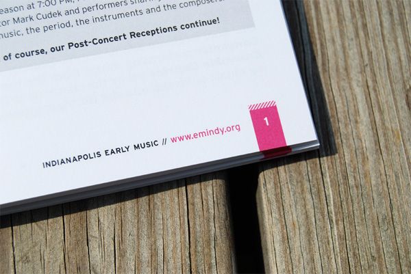 a close up of a piece of paper on a wooden table with an information card