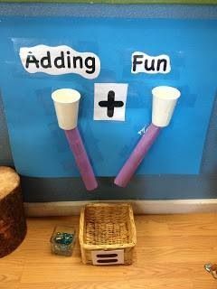 two toothbrushes are sitting on the wall next to a basket and other items