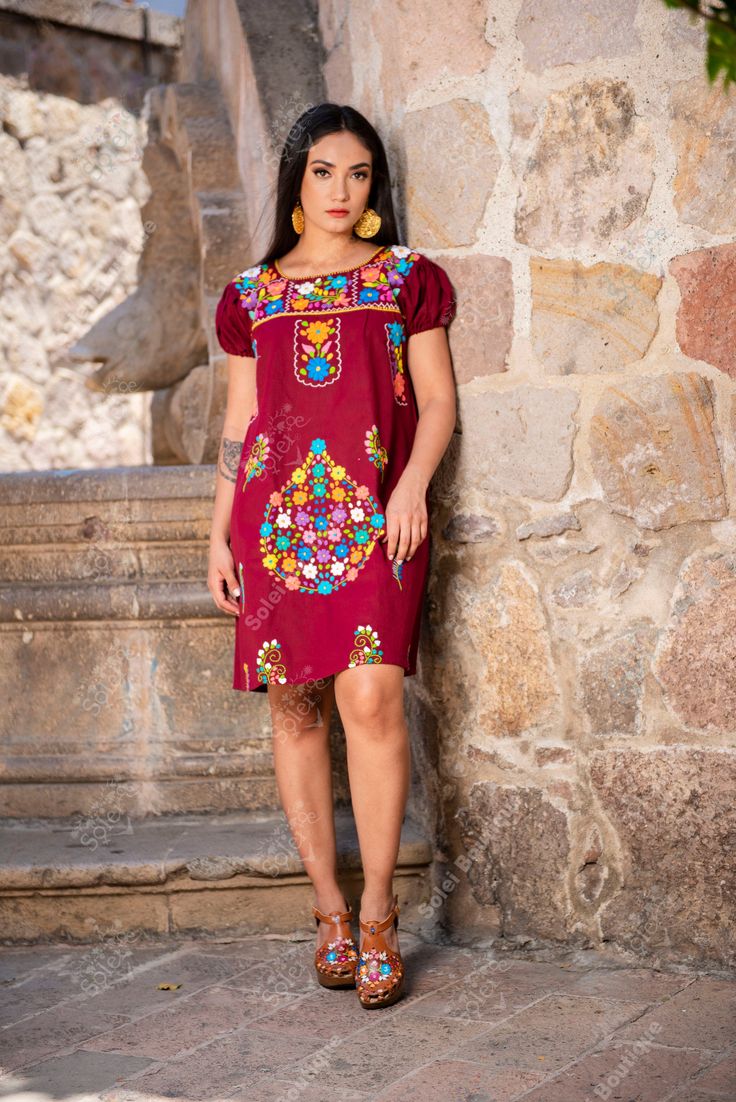 This Beautiful Floral embroidered Dress is the perfect dress to add to your wardrobe. -Its cute enough to dress up for a party or even just wear it to a picnic. -It's lightweight, handmade and hand embroidered by Mexican Artisans in Puebla, Mexico. Red Dresses With Embroidered Sleeves, Multicolor Floral Embroidered Knee-length Dress, Short Sleeve Cotton Dress With Multicolor Embroidery, Cotton Knee-length Dress With Embroidered Hem, Knee-length Cotton Dress With Embroidered Hem, Short Sleeve Cotton Dress With Geometric Embroidery, Embroidered Knee-length Mini Dress, Fitted Cotton Dress With Geometric Embroidery, Knee-length Multicolor Floral Embroidery Dress