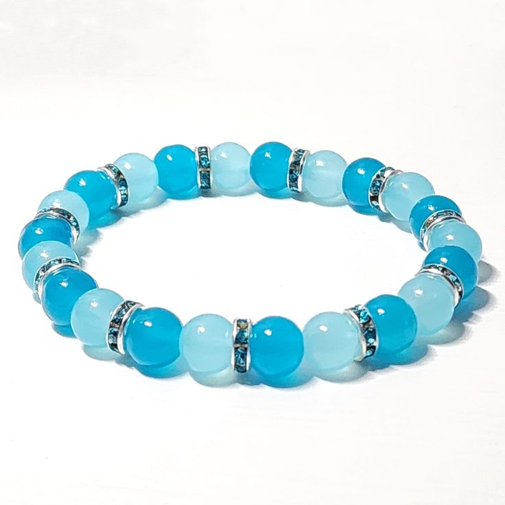 Blue Glass Beaded Stretch Bracelet 8mm Light Blue & Bright Blue Glass Beads Blue Rhinestone Rondelles Handmade By Me 7" Length New If You Want A Different Size Or Color Scheme, Please Let Me Know, I Can Customize For You. Cute Glass Bead Bracelets, Sorority Beaded Bracelets, Cute Blue Bracelet, Blue Diy Bracelet, Blue Crystal Bracelet With Stones For Gift, Blue Crystal Bracelet With Stones As A Gift, Blue Crystal Bracelet Gift, Elegant Blue Crystal Beaded Bracelets, Adjustable Blue Crystal Bracelet With Stones