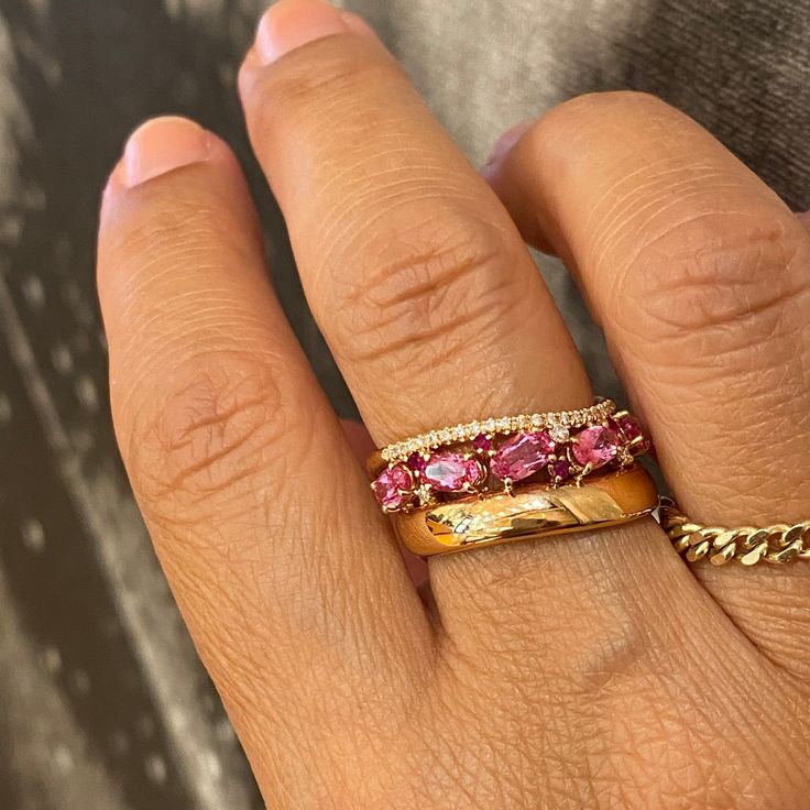 Another stunning piece of jewelry from MELIGreece's collection: a 18k rose gold wide ring band, paved with one row of mineral pink sapphires total weight 1.25 cts., another row of white diamonds 0.10 cts. and smaller rubies among the gemstones weighting 0.08 cts. Pink sapphires symbolize trust and faith. They are also believed to bring good luck and intense love.  This rose gold multi gemstone three row band with beautiful deep colors, made with care by our MELIGreece workshop in Athens. Size of Pink Lab-created Ruby Ring, Pink Ruby Ring With Rose Cut Diamonds, Pink Single Cut Diamond Promise Rings, Pink Ruby Ring With Single Cut Diamonds, Fine Jewelry Pink Ruby Ring With Single Cut Diamonds, Pink Ruby Ring With Single Cut Diamonds For Anniversary, Pink Ruby Ring With Single Cut Diamonds For Wedding, Ring Assortment, Wavy Design