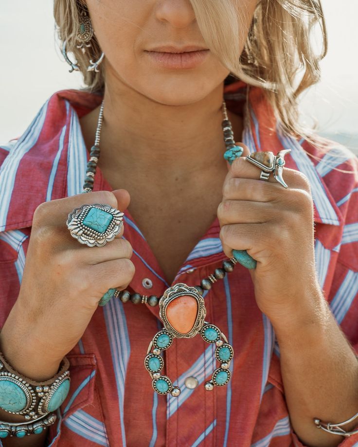 Details: Eye catching silver detailing on this turquoise stone ring makes this your go to accessory Adjustable band Nickel free. Read more → Natural stones are unique and may vary in size, color, and shape Dimensions: Length: 1.5-inch Southwestern Turquoise Ring With Natural Stones, Adjustable Turquoise Ring With Gemstones, Adjustable Turquoise Ring With Stones, Southwestern Style Turquoise Ring, Festival Jewelry With Gemstones, Western Style Nickel Free Turquoise Jewelry, Western Style Gemstone Ring, Adjustable Southwestern Turquoise Necklace, Western Style Gemstone Ring Jewelry