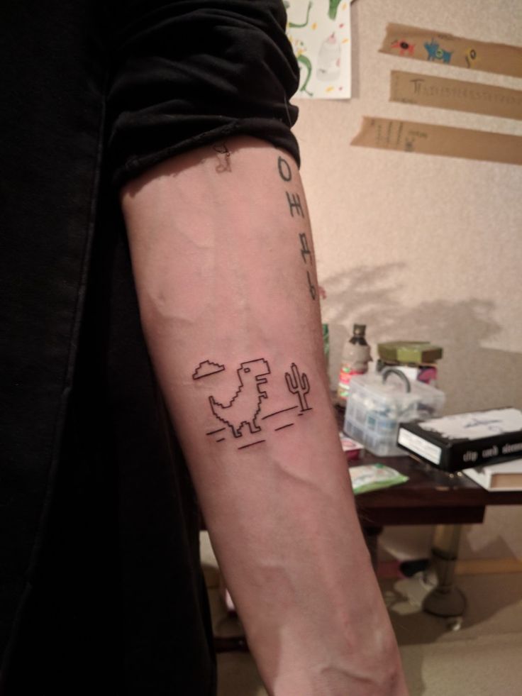 a person with a tattoo on their arm