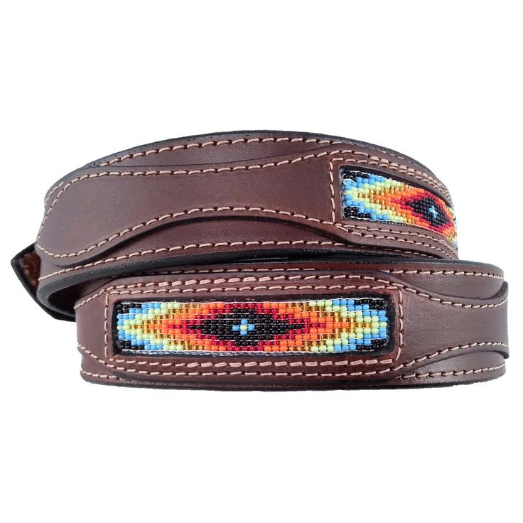 td {border: 1px solid #ccc;}br {mso-data-placement:same-cell;} Made in the USA Full-Grain Bridle Leather Native American (Navajo) beadwork 1 7/16" Wide Leather, 1 1/2" Buckle Two snap design for easy buckle change Santa Fe Leather Company uses one solid thick piece of the finest full-grain bridle leather to make this beautiful belt.The body of these belts are made from one thick solid piece of full-grain leather (9-10 ounce leather, about .15" thick). These are the toughest belts that money can Traditional Adjustable Concho Belt, Southwestern Hand Tooled Leather Belt, Southwestern Hand Tooled Leather Belt Buckles, Traditional Leather Belt With Concho, Southwestern Style Hand Tooled Leather Belt, Adjustable Artisan Leather Belt Buckles, Adjustable Southwestern Concho Belt Buckles, Adjustable Southwestern Leather Belt, Bohemian Leather Adjustable Belt Buckles