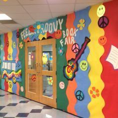 the hallway is decorated with colorful wallpaper and peace signs