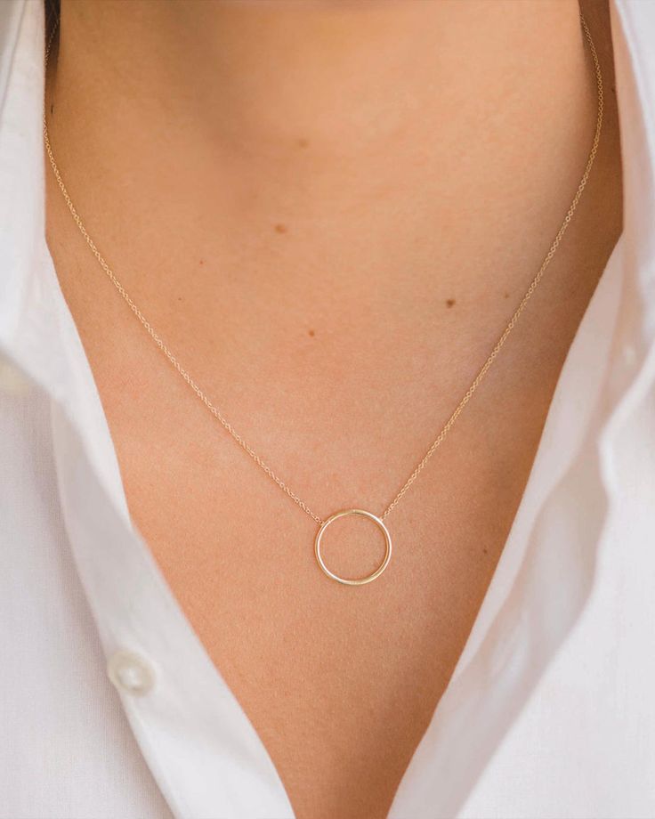 14K solid gold circle ring necklace in the color of your choice. A simple, dainty and classic piece. Sits beautifully by itself or layered, an everyday kind of necklace that will be your new obsession! Made in L.A. Size of Circle: Approx. 13mm Ships in 4-8 business days Rush order ships in 1-5 business days Comes gift ready in a custom Zoe Lev jewelry box Gold Circle Ring, Gold Circle Necklace, New Obsession, Gold Circle, Circle Ring, Circle Necklace, Necklace Sizes, Ring Necklace, Chain Lengths