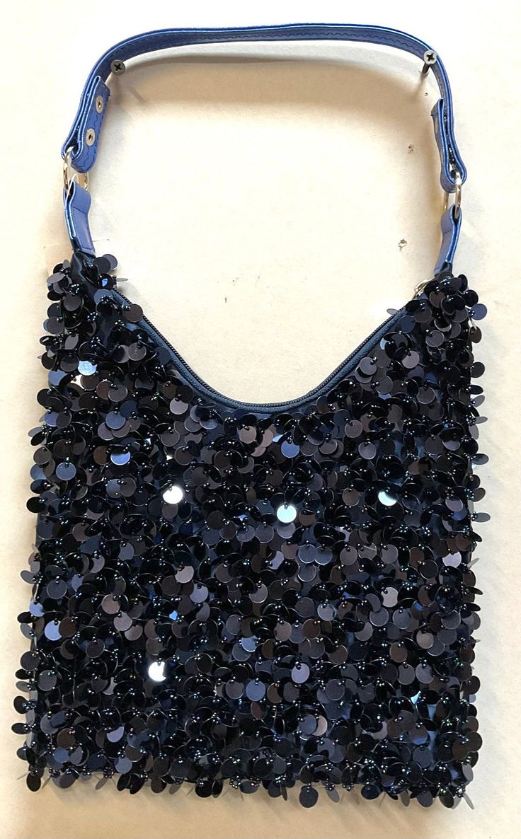 This cool and funky purse is perfect for pairing up with a cute dress! Funky Purses, Hand Beaded Bag, Beaded Bag, Hobo Bags, Beaded Bags, Hobo Handbags, Cute Dress, Hand Beading, Purses And Handbags