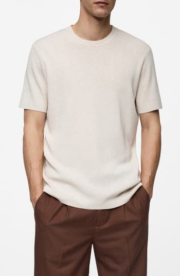 This neutral-hued and lightweight T-shirt takes you right into the chilly season with a look that layers well. Crewneck Short sleeves 45% polyester, 35% viscose, 20% cotton Hand wash, line dry Imported Casual Relaxed Fit Fine Knit T-shirt, Cream Fine Knit Crew Neck Top, Fine Knit Short Sleeve T-shirt For Fall, Beige T-shirt For Spring Workwear, Fine Knit Relaxed Fit Crew Neck T-shirt, Casual Fine Knit Relaxed Fit T-shirt, Casual Fine Knit T-shirt For Fall, Fine Knit Casual T-shirt For Fall, Fine Knit Short Sleeve T-shirt