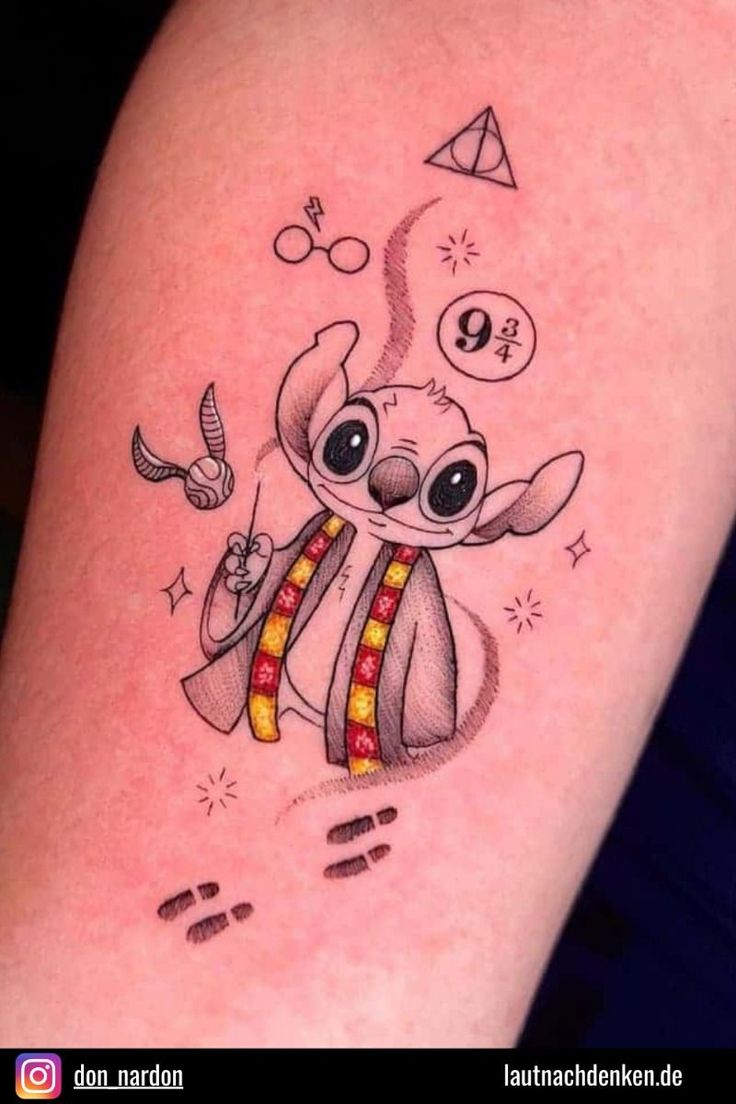 a tattoo with a cartoon character on it