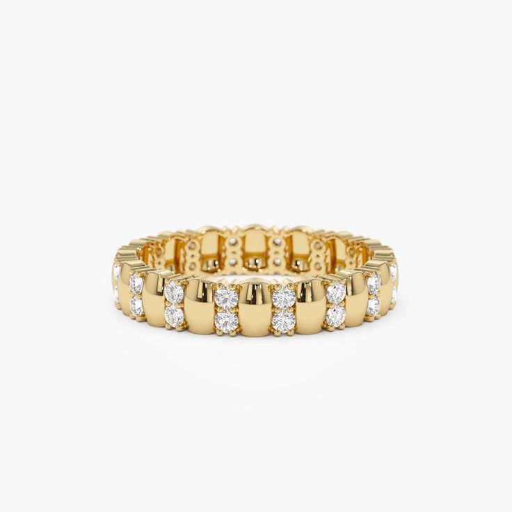 an 18k yellow gold and diamond bracelet, with rows of diamonds on each side