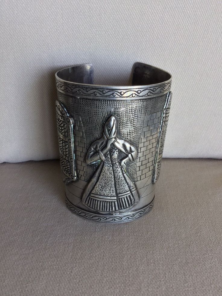 Vintage Peruvian Folkloric Sterling Long Cuff Bracelet - Artistic Etched Picture w Onlayed Design - Fine Execution - Makers Mark, Peru, .925 - No Scratches, Cracks or Dents - Like New Vintage Condition Etched Design is of a Tiled Walkway and Patterned Wall with Etched Onlays of Woman wearing Shawl, Window and Doorway on Street Scene.  Beautiful Scallop Design etched into edges of bracelet - Spanish Colonial influence Specifications:  Total Weight: circa 151.1 grams (c 5.32 oz) Size:  circa 3 1/2" L x Tapers from 2 3/8" to 2 5/8" W - Opening on back c 1 3/8" Flexible enough to open wider to accommodate a larger arm. Smooth Edges for a NO Scratch Wear. Installment Payments Available at Checkout!  Returns accepted if in Original Shipped Condition - Do NOT Polish It will be necessary to sign f Artistic Silver Cuff Bracelet, Traditional Handmade Sterling Silver Bracelet For Formal Occasions, Artistic Metal Cuff Bracelet Bangle, Traditional Etched Cuff Bracelet, Artistic Metal Cuff Bracelet, Artistic Silver Cuff Bracelet Bangle, Artistic Silver Cuff Bangle Bracelet, Silver Cuff Bracelet For Ceremonial Occasions, Artistic Silver Bangle Cuff Bracelet