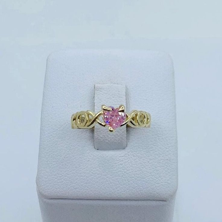 ❤️ Real 10k Gold Ring Band pink heart with XOX ❤️ Size 6 ❤️ Women's engagement / wedding ring  / birthday October birthstone  ❤️ New Fine Jewelry  ❤️ Pink heart Checkout my other jewelry  ❤️ Anillo de Oro de 10k Banda con corazón ❤️ Sortija de mujer tamaño 6.5 ❤️ Piedra zirconia Rosa  y blanca  ❤️ Joyería nueva SKU 41472 Pink Round Cut Diamond Ring For Anniversary, Gold Heart Promise Ring With Center Stone, Pink Diamond Ring With Birthstone, Pink Diamond Birthstone Ring, Pink Diamond Promise Ring In Fine Jewelry Style, Pink Diamond Ring With Birthstone In Round Shape, Pink Gold Promise Ring, Gold Heart Ring With Accent Stones For Promise, Gold Heart Ring With Center Stone For Promise