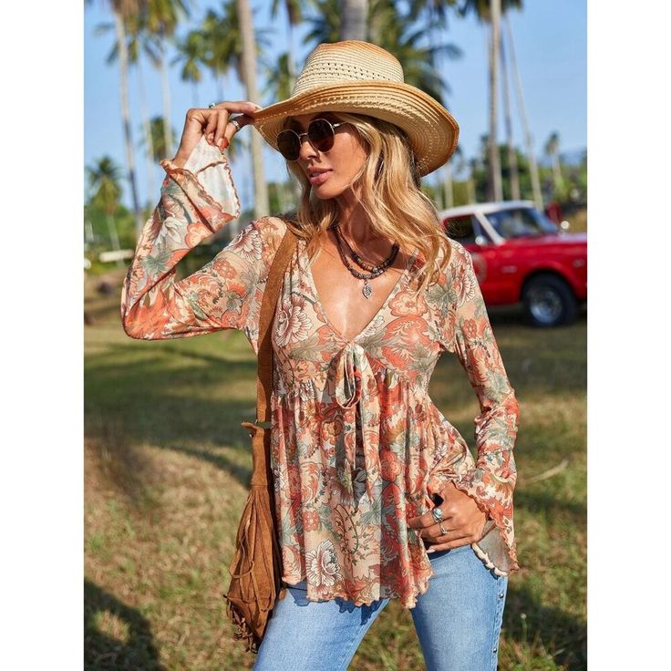 Material: 94% Polyester, 6% Elastane Xs=2 S=4 M=6 L=8/10 Xl=12 Shop Our Full Collection Of: Vacation Outfit - Preppy - Y2k - Cottagecore - Gypsy - Boho - Tiktok - Classic - Classy - Trendy - Work Office - Business Casual - Contemporary - Minimalist - Business Professional - Workplace Wear - Fall - Winter - Spring - Summer - 90s - Date Night - Wedding Guest - Bridesmaid - Bachelorette - Baby Shower - Casual - Dressy - Hippie - Beach - Birthday Gift - Resort - 00s - Cruise - Travel - Light Academi Orange Bohemian V-neck Top, Flowy Orange Blouse For Vacation, Orange V-neck Top For Festivals, Multicolor Bohemian Blouse For Fall, Bohemian Multicolor Blouse For Fall, Peach Blouse For Vacation, Bohemian Multicolor Fall Blouse, Brown Paisley Print Summer Tops, Summer Brown Paisley Print Tops