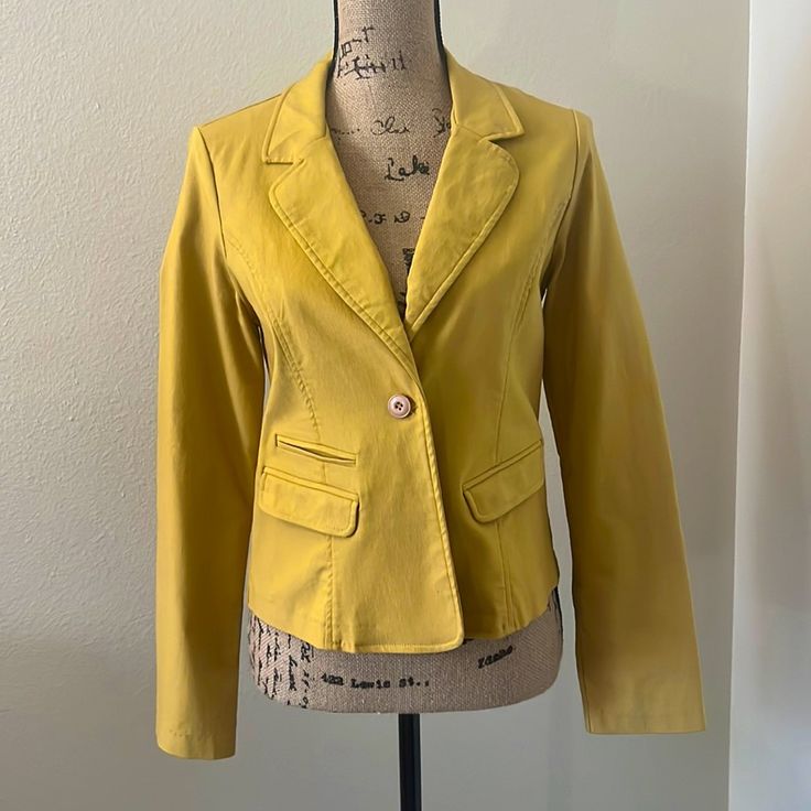 Never Worn!! This Single Button Blazer Is So Cute! Great With Jeans And Heels Or Simply A Dress And Sandals! Wear It To The Office, Out For A Girls’ Night Or Just Casually! Size Large Stretchy Material Spring Yellow Blazer With Pockets, Casual Yellow Blazer For Work, Trendy Yellow Spring Blazer, Yellow Long Sleeve Blazer With Button Closure, Gold Outerwear For Work In Spring, Gold Blazer For Spring Workwear, Gold Blazer For Workwear In Spring, Trendy Yellow Outerwear With Button Closure, Yellow Fitted Blazer With Pockets