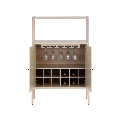 a wooden cabinet with wine glasses and bottles on it's shelf, against a white background