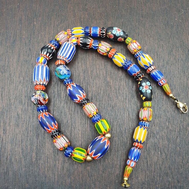 Venetian Style Trade beads Vintage Mix Chevron Glass Beads necklace Stunning Vintage Venetian Style Trade Vintage Multicolor Glass Chevron Beads Necklace * Stunning Old Chevron Beads 6 Layers  * Full Strand 24 Inches  Chevron Beads. * Great for collectors of for jewelry makers * Style - Beaded + Type - Necklace                           INFORMATION                         SHIPPING,PAYMENT,                         RETURN,FEEDBACK 1:We Freely Ship all our items to all over Glass Faceted Beads Necklace With Round Beads, Bohemian Jewelry With Large Glass Beads, Unique Czech Glass Necklaces With Large Beads, Czech Glass Necklaces With Large Beads For Jewelry Making, Artisan Long Necklace With Colorful Beads, Colorful Glass Beaded Necklaces With Round Beads, Glass Beads Long Necklace As Gift, Glass Beaded Necklaces With Faceted Beads For Gifts, Long Glass Beaded Necklace As Gift