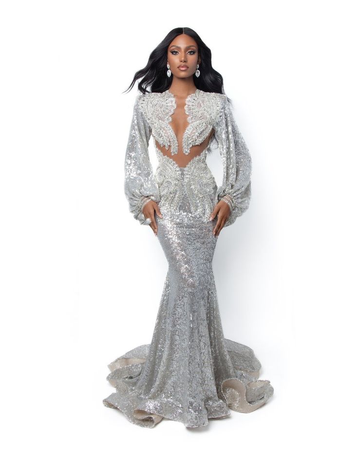 Dounia Fitted Long Sleeve Embellished Gown, Elegant Gown For Prom Season And Glamorous Events, Elegant Gown For Glamorous Events During Prom Season, Long Sleeve Embellished Evening Dress With Fitted Bodice, Embellished Evening Dress With Fitted Bodice And Long Sleeves, Glamorous Long Sleeve Evening Dress With Sweep Train, Long Sleeve Gown With Embellished Fitted Bodice, Embellished Gown With Fitted Bodice And Long Sleeves, Embellished Long Sleeve Gown With Fitted Bodice