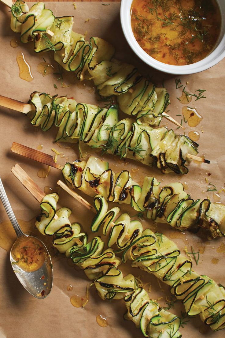 zucchini skewers with dipping sauce and spoons