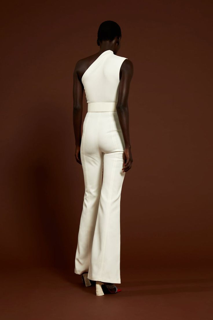 The Cleo Jumpsuit in Cream – Solace London US Glamorous One-shoulder Fitted Jumpsuits And Rompers, One-shoulder Strapless Jumpsuit For Party, Fitted Strapless Wide-leg Jumpsuit For Evening, Elegant Flared Fitted Pantsuit, Chic Fitted Flare Jumpsuits And Rompers, Elegant Fitted Pants For Cocktail, Elegant Fitted Cocktail Pants, Fitted Jumpsuits And Rompers With Asymmetrical Neckline For Party, Chic Asymmetrical Party Pants