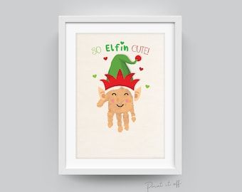 a cross stitch christmas card with an elf's hat and the words go elfin cute