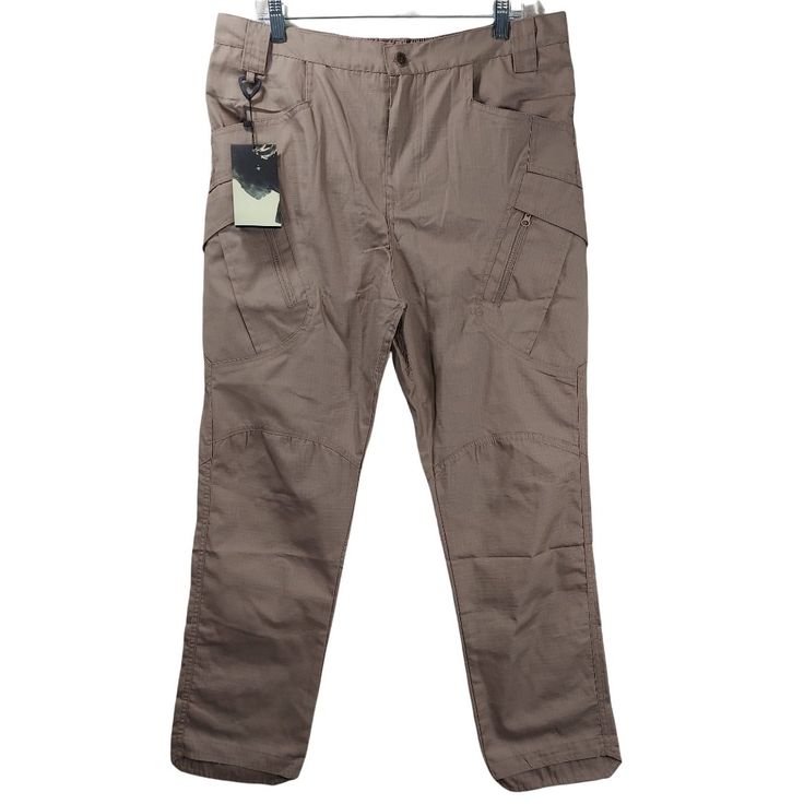 Nwt Outdoor Equipment Tactical Pants Military Tapered Leg Cargo Pants Size Xl 34 Brand New W/ Tag Approximate Pant Flat Lay Measurements In Inches - (1)Waist = 18" - (2)Rise = 14" - (7)Inseam = 29" - (8)Leg Opening = 7.5" Please Message Me If You Have Any Questions *Disclaimer* - We Will Deliver The Item To The Carrier Within One Business Day Of Payment Received. Once Given To The Carrier, We Can Only Track The Item Using The Tracking Information That We Will Provide. We Cannot Guarantee That Yo Tactical Khaki Bottoms For Outdoor Activities, Tactical Khaki Cargo Pants For Outdoor Work, Tactical Khaki Pants With Pockets, Khaki Techwear Cargo Pants For Hiking, Techwear Khaki Cargo Pants For Hiking, Tactical Khaki Work Pants For Outdoor, Khaki Tactical Outdoor Work Pants, Beige Cargo Pants For Outdoor Activities, Tactical Khaki Bottoms For Outdoor Work