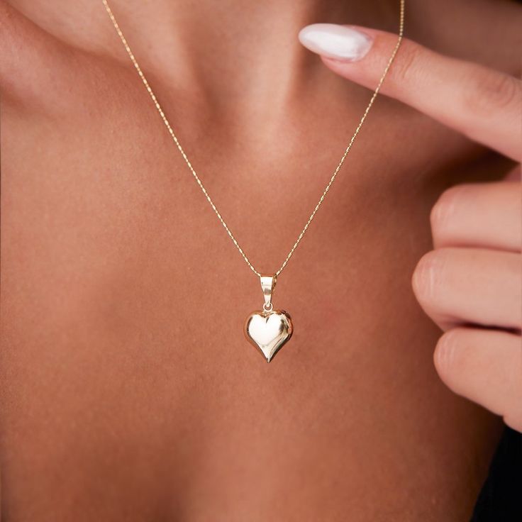 14k Gold Medium Heart NecklaceDetailsAvailable in 14k Gold, 14k Rose Gold, and 14k White GoldTotal Weight: Necklace: 2.65 GrPendant: 0.90 GrChain: 1.75 GrColor Selection: Yellow, Rose, WhiteChain: 14k Gold and 45 cm (18 inches) *Model in the photo wears 18 inches (45 cm) chain.GiftingEach design will arrive artfully presented in our branded gift boxes wrapped in a signature ribbon. Production & Delivery Production: 5 - 7 business days Delivery: 1 - 3 business days worldwide via Express Delivery Valentine's Day 14k Gold Pendant Necklace, Rose Gold Heart Pendant Necklace Fine Jewelry, 14k Gold Heart Charm Necklace For Her, 14k Gold Heart Charm Necklace As Gift For Her, 14k Gold Pendant Necklace For Valentine's Day, Rose Gold Heart Pendant Locket Necklaces, Fine Jewelry Rose Gold Necklace With Heart Charm, Rose Gold Heart Pendant Necklace Gift For Her, Rose Gold Heart Charm Fine Necklace