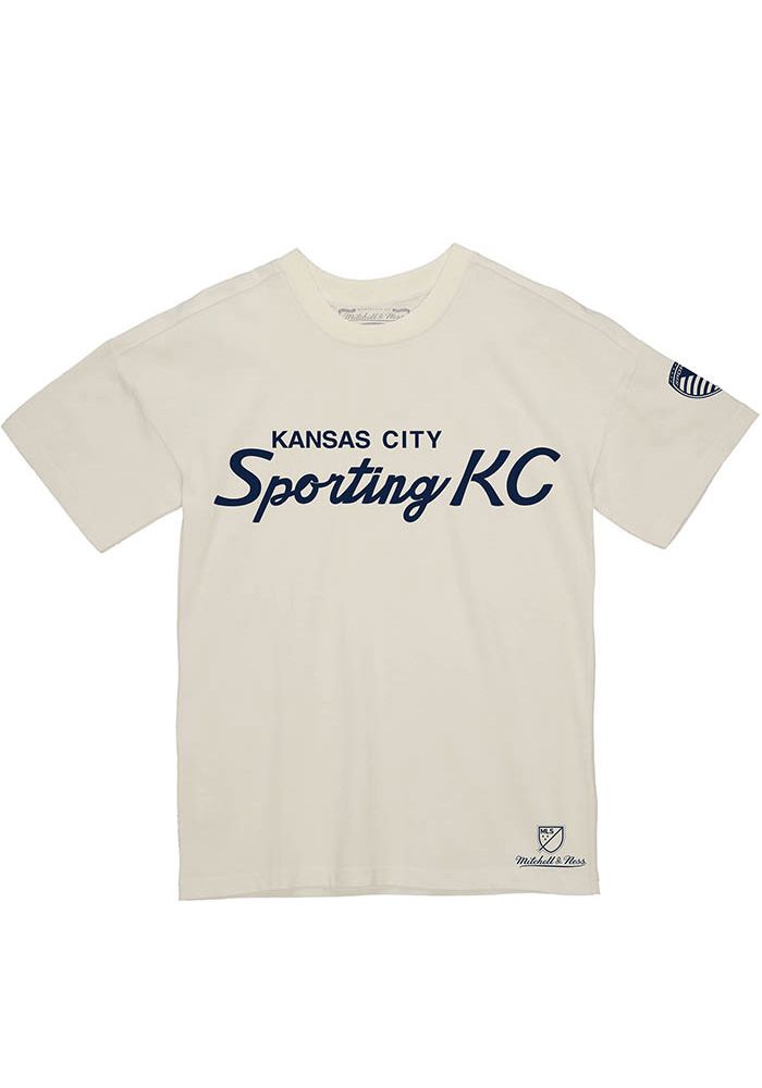 Show off your team pride in this Sporting Kansas City White Sporting KC Script Short Sleeve T Shirt! This SKC Short Sleeve Tee features a script team name screen printed on chest. Make sure everyone knows you root for the Sporting KC with this White SKC T Shirt. Go Sporting! Lightweight material, Crew neckline, Screen print team graphic, Unisex, Officially Licensed, Fit: True to Size, 100% COTTON, Machine Washable, 4 Throwback Cotton Tops With Team Name, Throwback Cotton Tops For Sports Season, Throwback Cotton Tops For Sports Events, Retro Cotton Tops With Team Logo, Retro Cotton Top With Team Logo, Retro White Top With Letter Print, Throwback White Tops With Letter Print, White Letter Print Throwback Top, White Throwback Letter Print Top